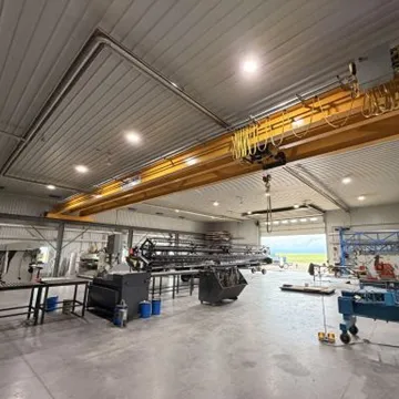Gas radiant infrared tube heaters in an industrial building