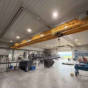 Engineer reviewing radiant tube heater plans
