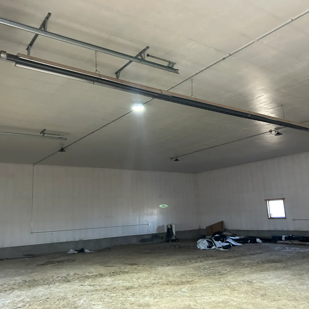 Radiant tube heater installed in industrial facility