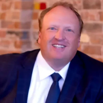 Portrait of Travis Colledge, Chief Financial Officer of Commercial Funding Partners