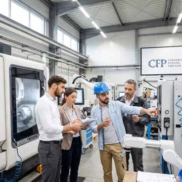 Business leaders reviewing equipment leasing options