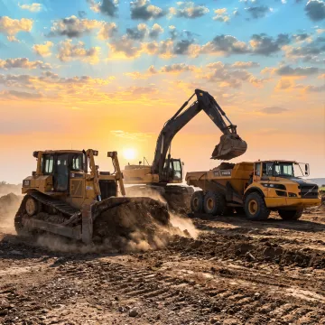 Construction excavator and machinery at an active jobsite