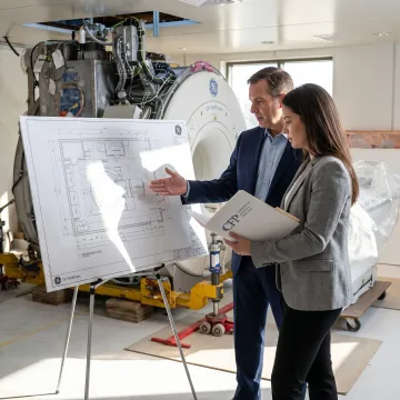 Healthcare administrator reviewing MRI financing options