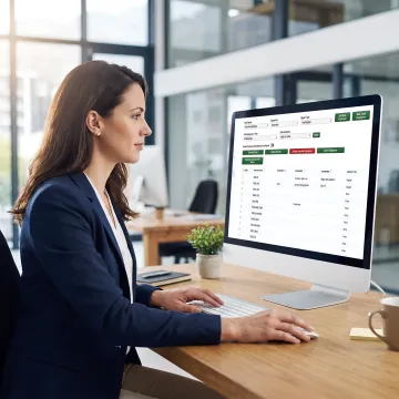 HR professional reviewing employee benefits reports