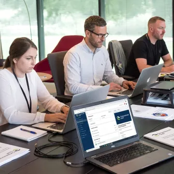 IT help desk team taking online support training