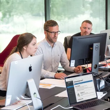 IT team completing online customer service training