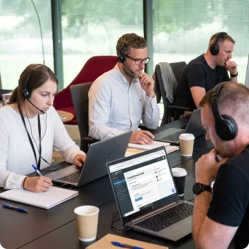 Technical support team learning customer service skills