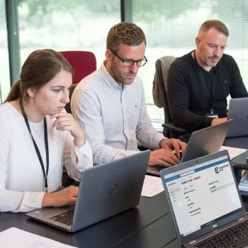 IT support team discussing customer service practices