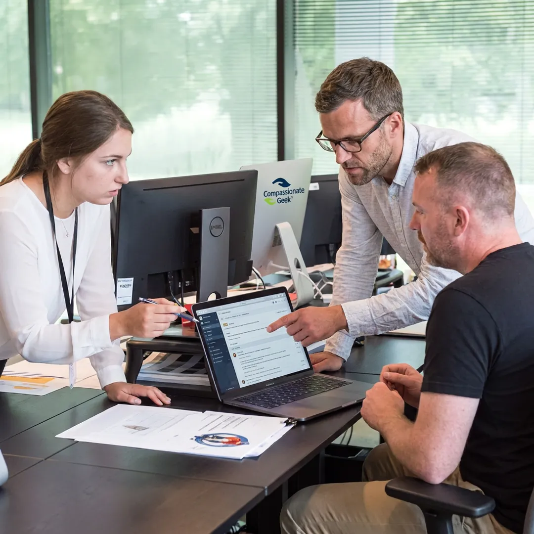 IT support team discussing customer service