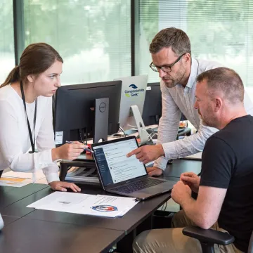 IT support team discussing customer service