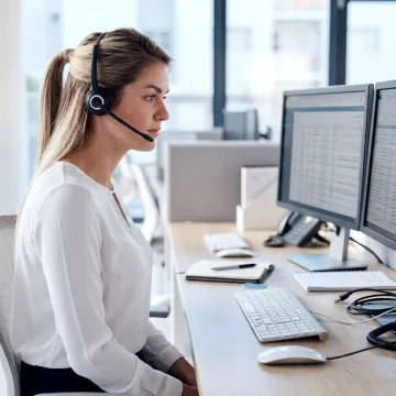 IT support professional listening to a customer