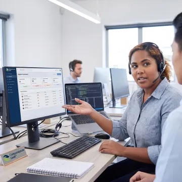 IT help desk professional assisting a customer
