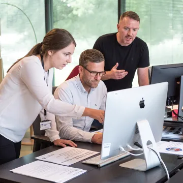IT support team participating in customer service training