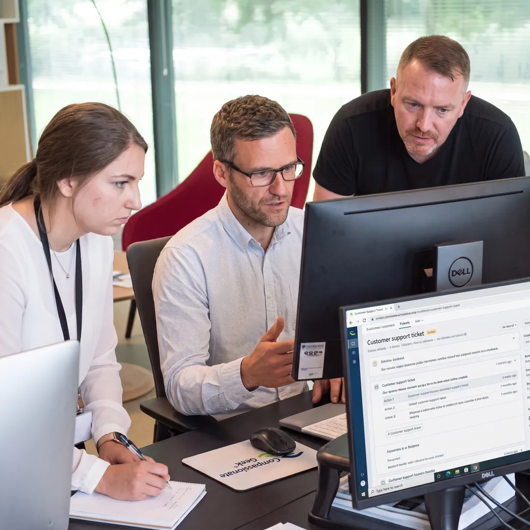 IT team collaborating on customer support