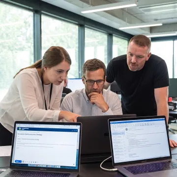IT team reviewing customer-focused email communication