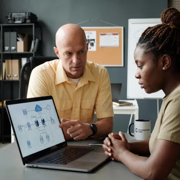 IT professional explaining a solution to a client