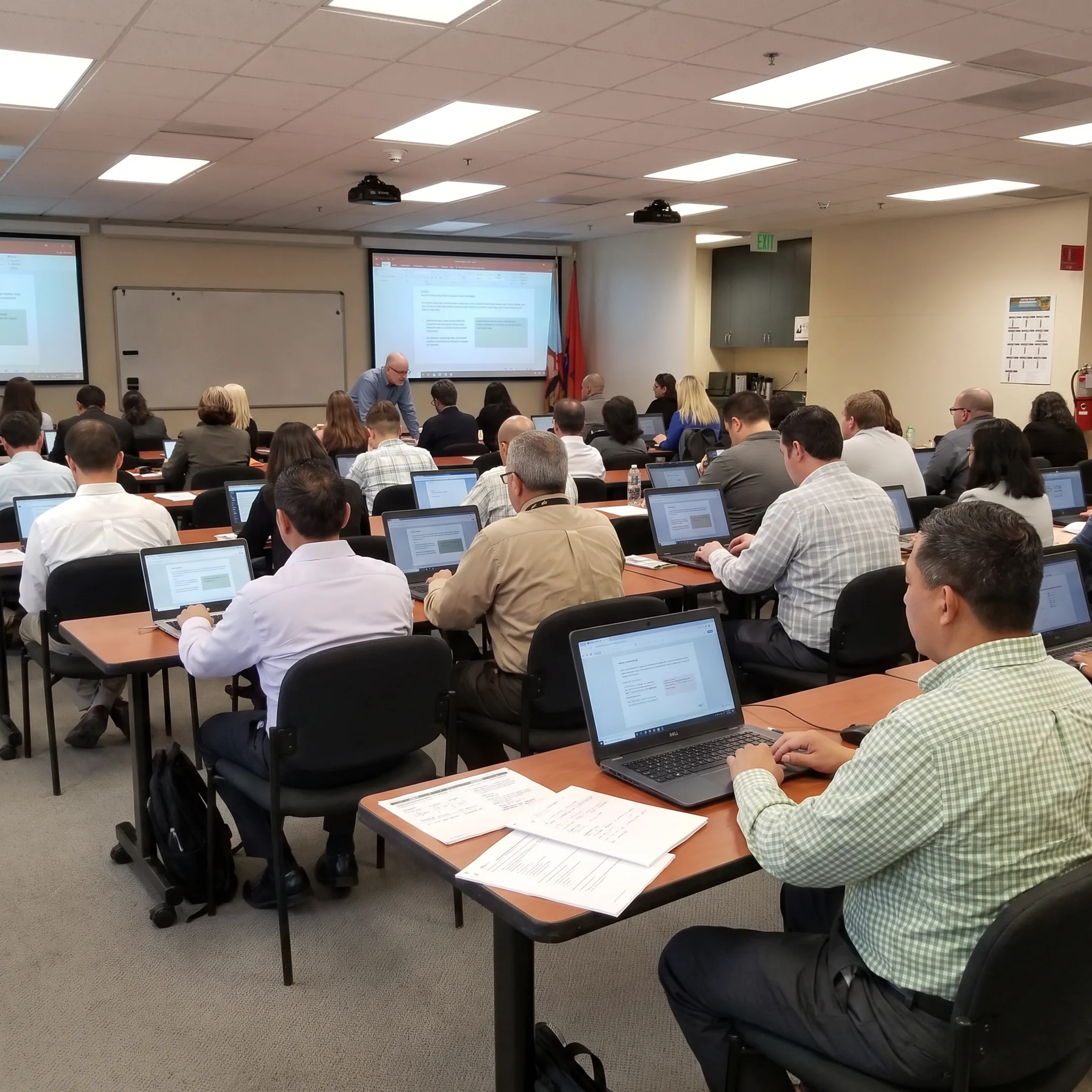 IT support team learning compassionate customer service techniques in an online training session