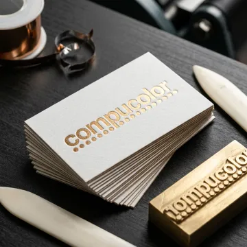 Embossed business card finishing close-up