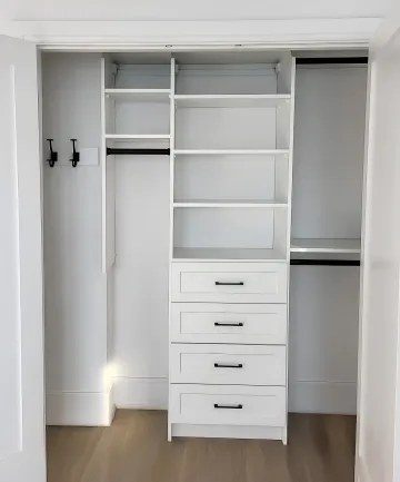 Designer reviewing custom kitchen cabinet plans