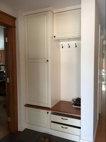 Custom farmhouse mudroom with bench and cubbies