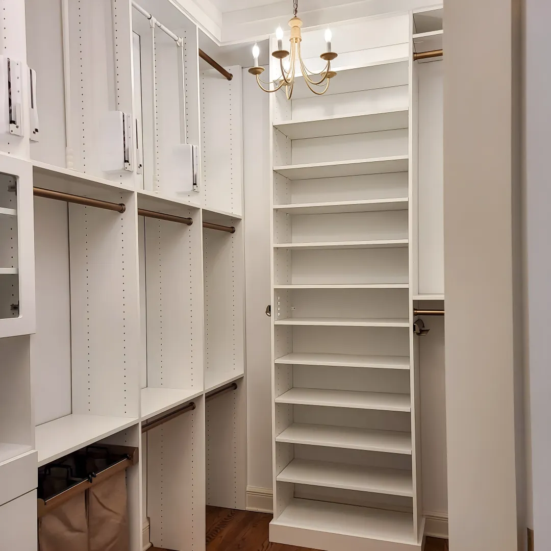 Designer reviewing custom closet plans