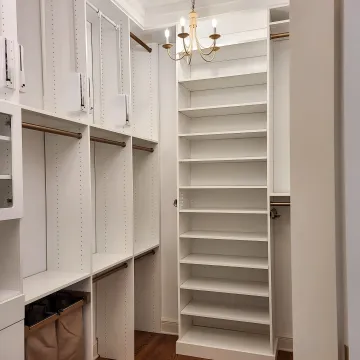 Designer reviewing custom closet plans