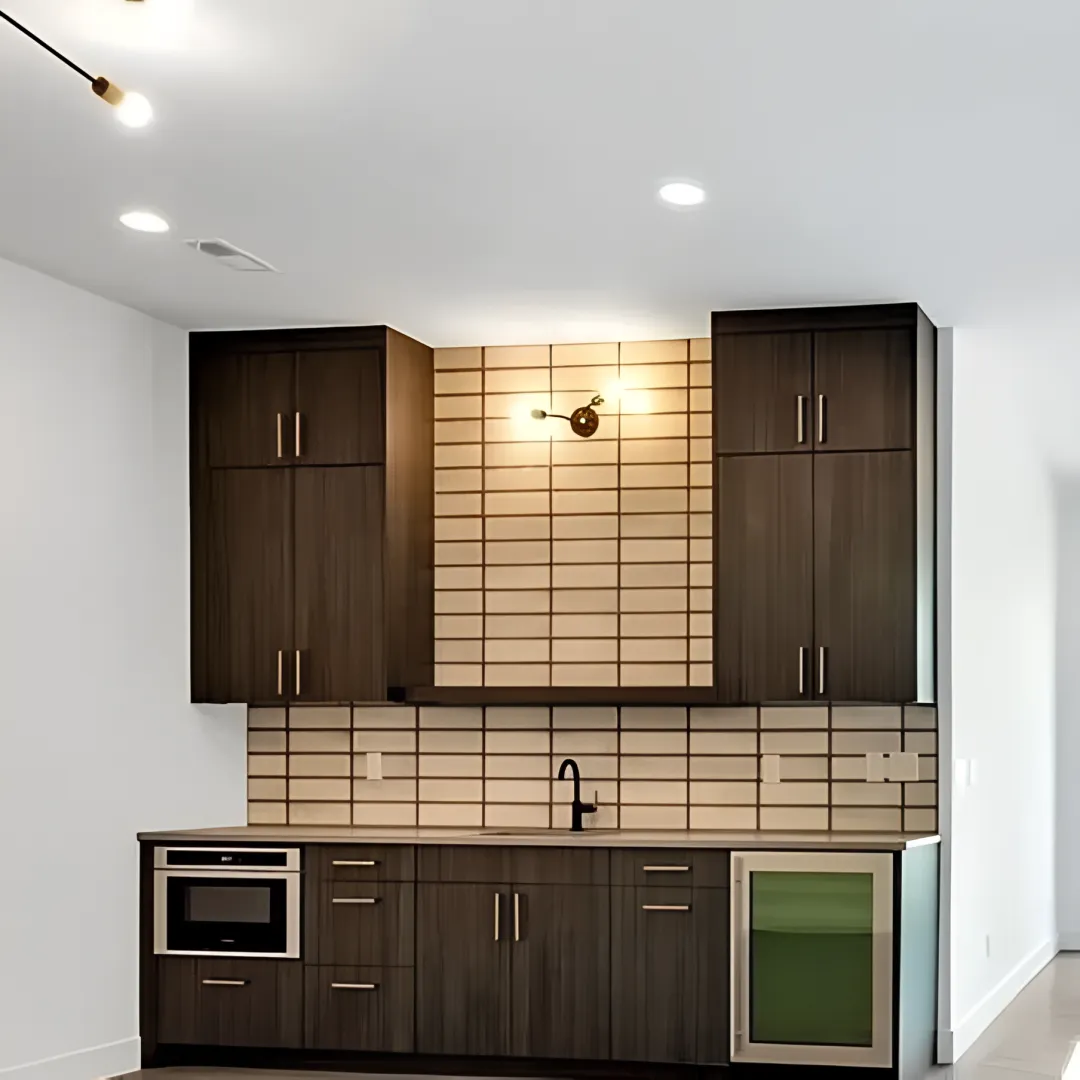 Cabinet designer reviewing custom wine bar plans