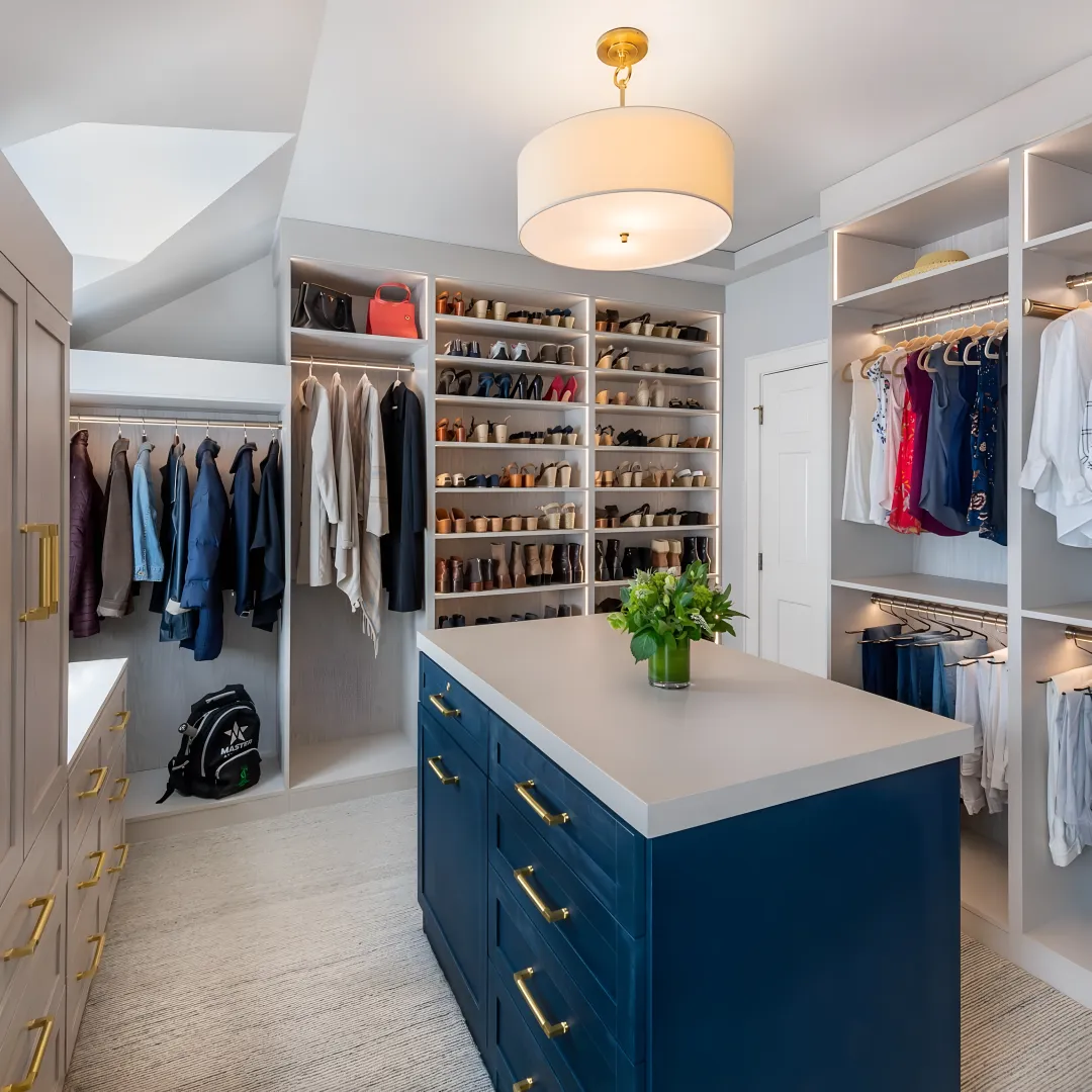 Custom laundry room with cabinets and folding counter