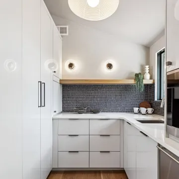 Designer reviewing custom pantry plans