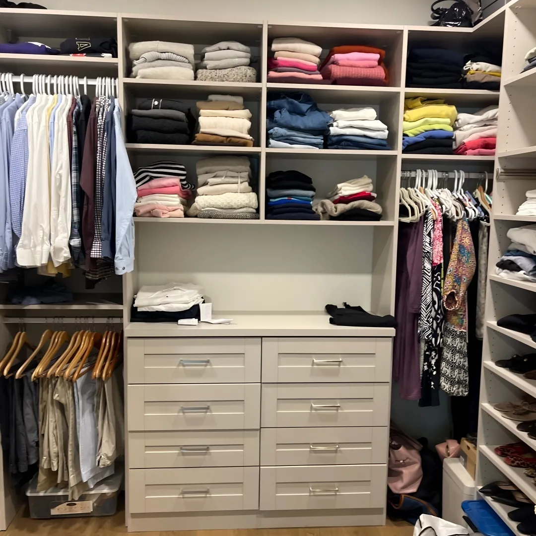 Designer reviewing custom closet plans