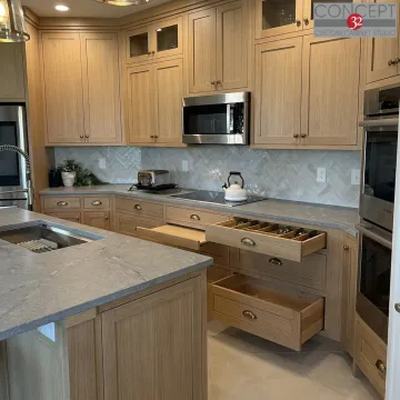 Custom inset kitchen cabinets in a refined home kitchen
