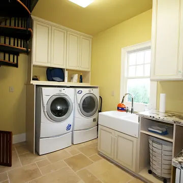 Cabinet installer fitting custom laundry room storage