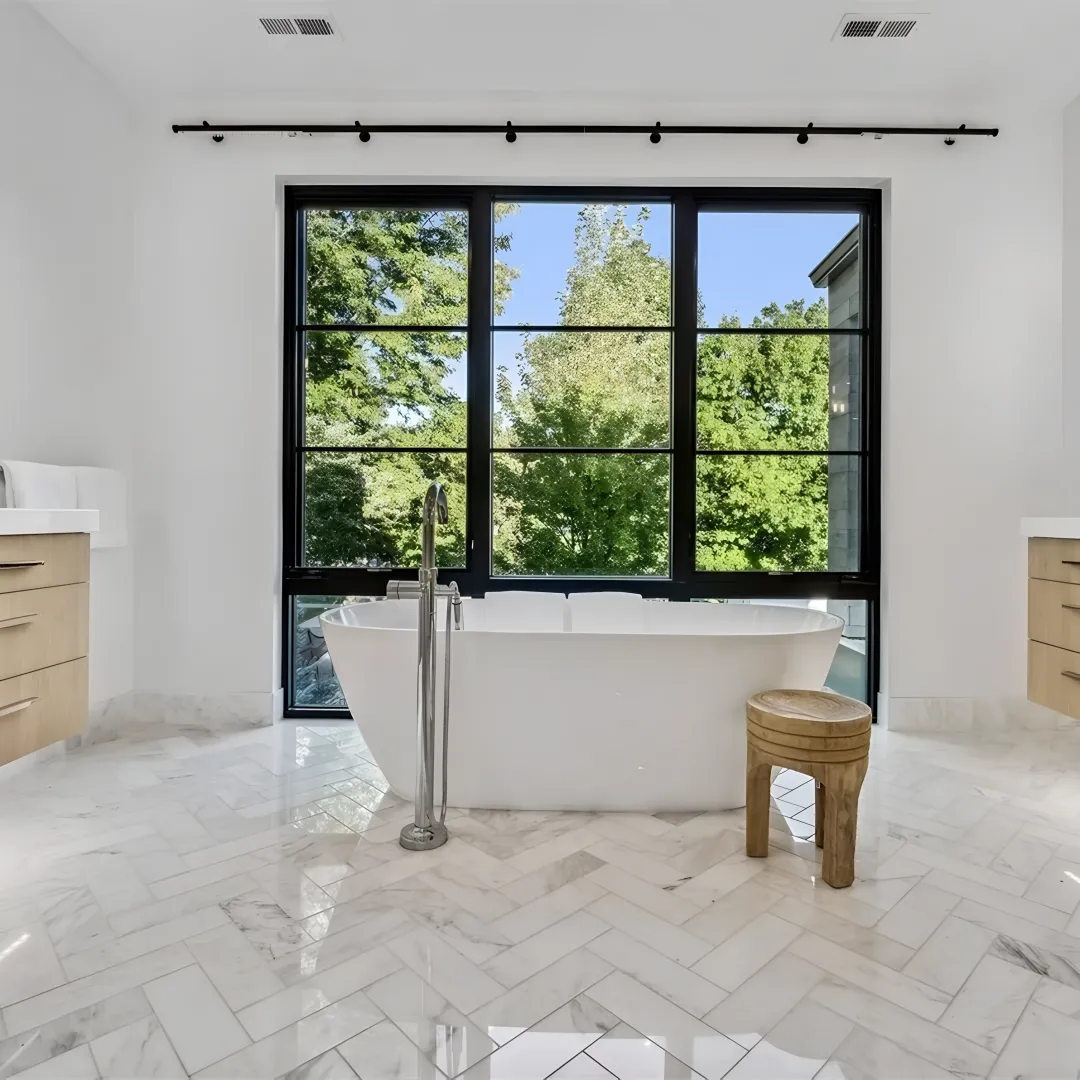 Designer measuring a custom bathroom vanity space