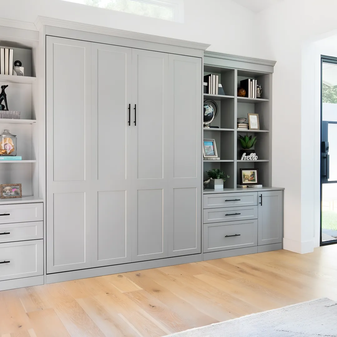 Installer measuring a room for a custom Murphy bed