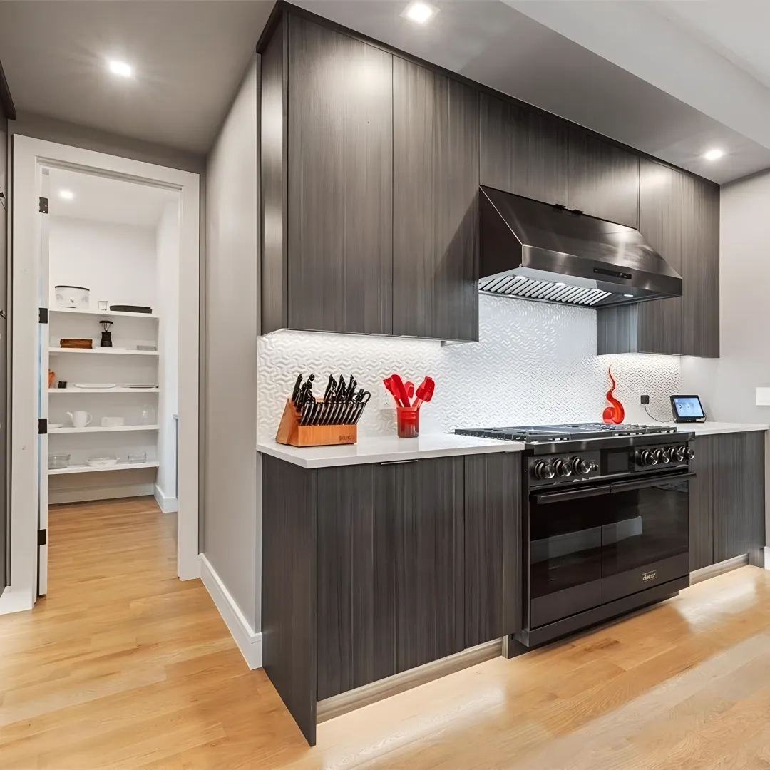 Designer reviewing kitchen cabinet plans