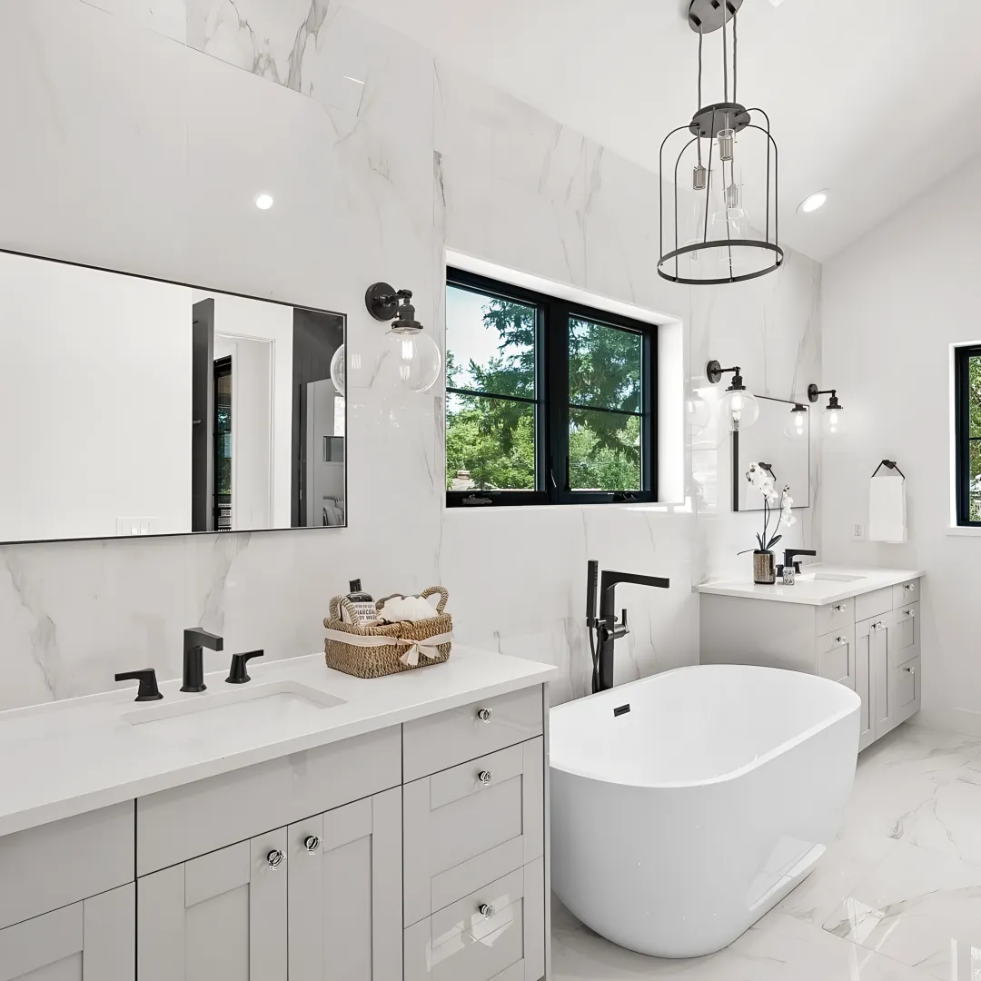 Designer measuring for custom bathroom cabinets