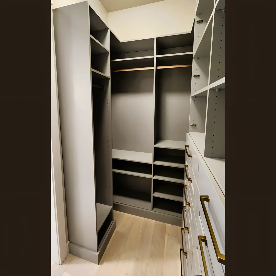 Custom walk-in closet with built-in drawers and shoe storage