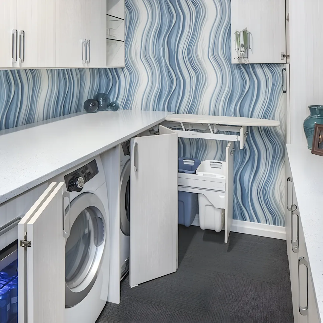 Custom remodeled laundry room with cabinets