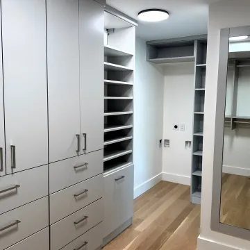 Cabinet designer reviewing custom kitchen plans