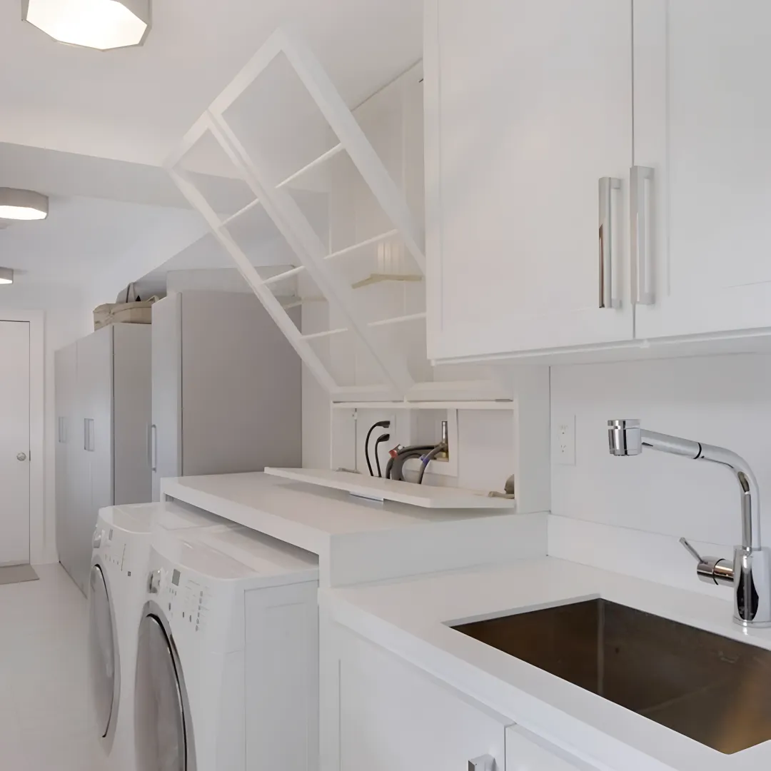 Designer reviewing custom laundry room cabinet plans