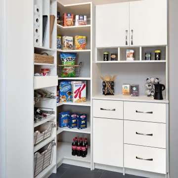 Designer measuring kitchen cabinet for pull out shelves