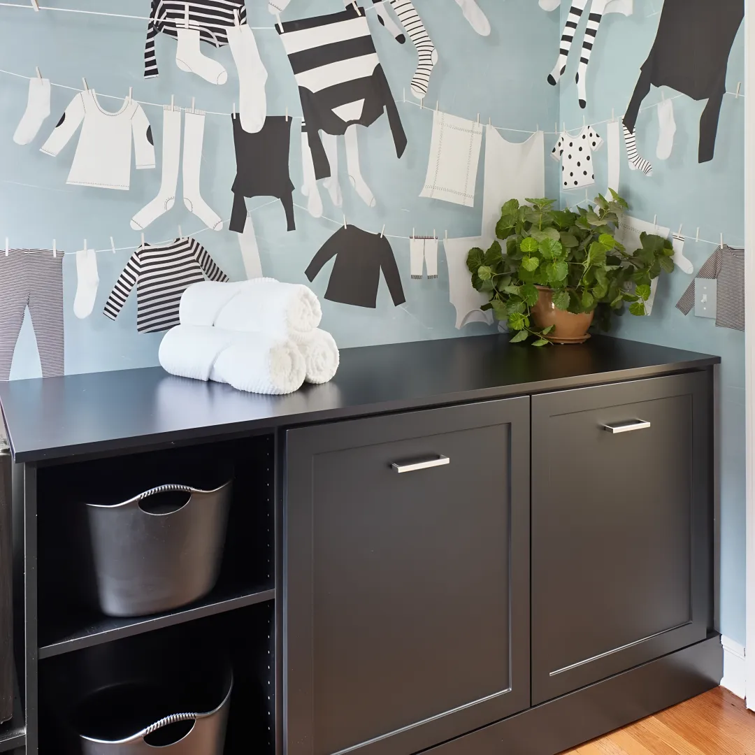 Custom laundry room storage with cabinets and washer dryer