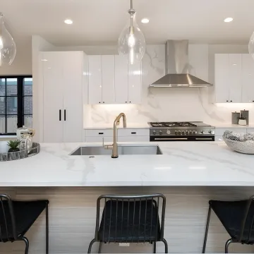 Cabinet designer measuring kitchen cabinet doors