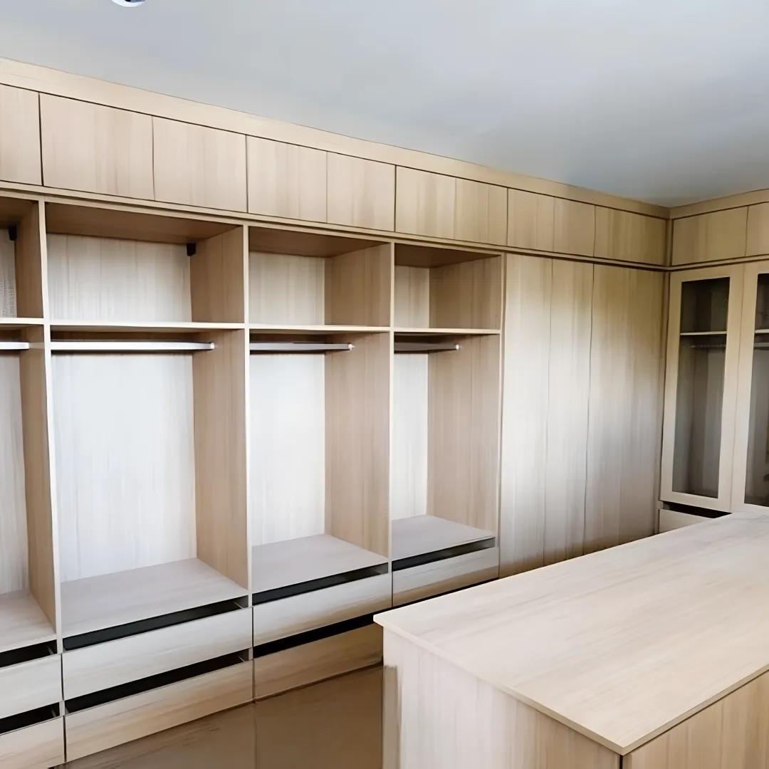 Designer measuring a custom shoe closet