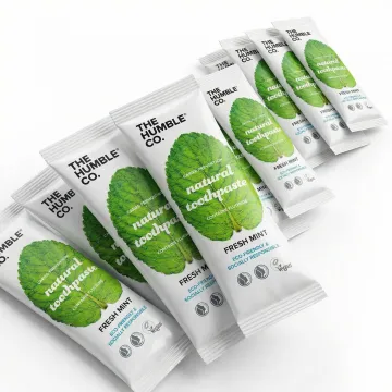 Colorful branded stick packs arranged on production surface