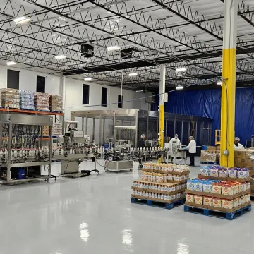Modern co-packing facility with creamer production line and packaging equipment