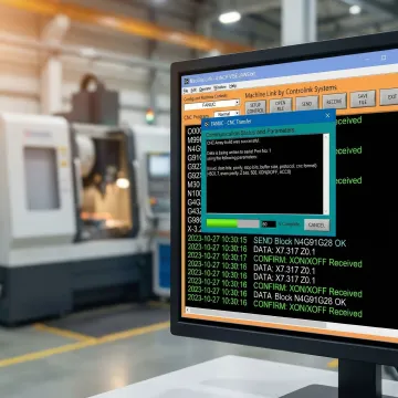 Software interface showing CNC program file transfer status on a shop-floor computer