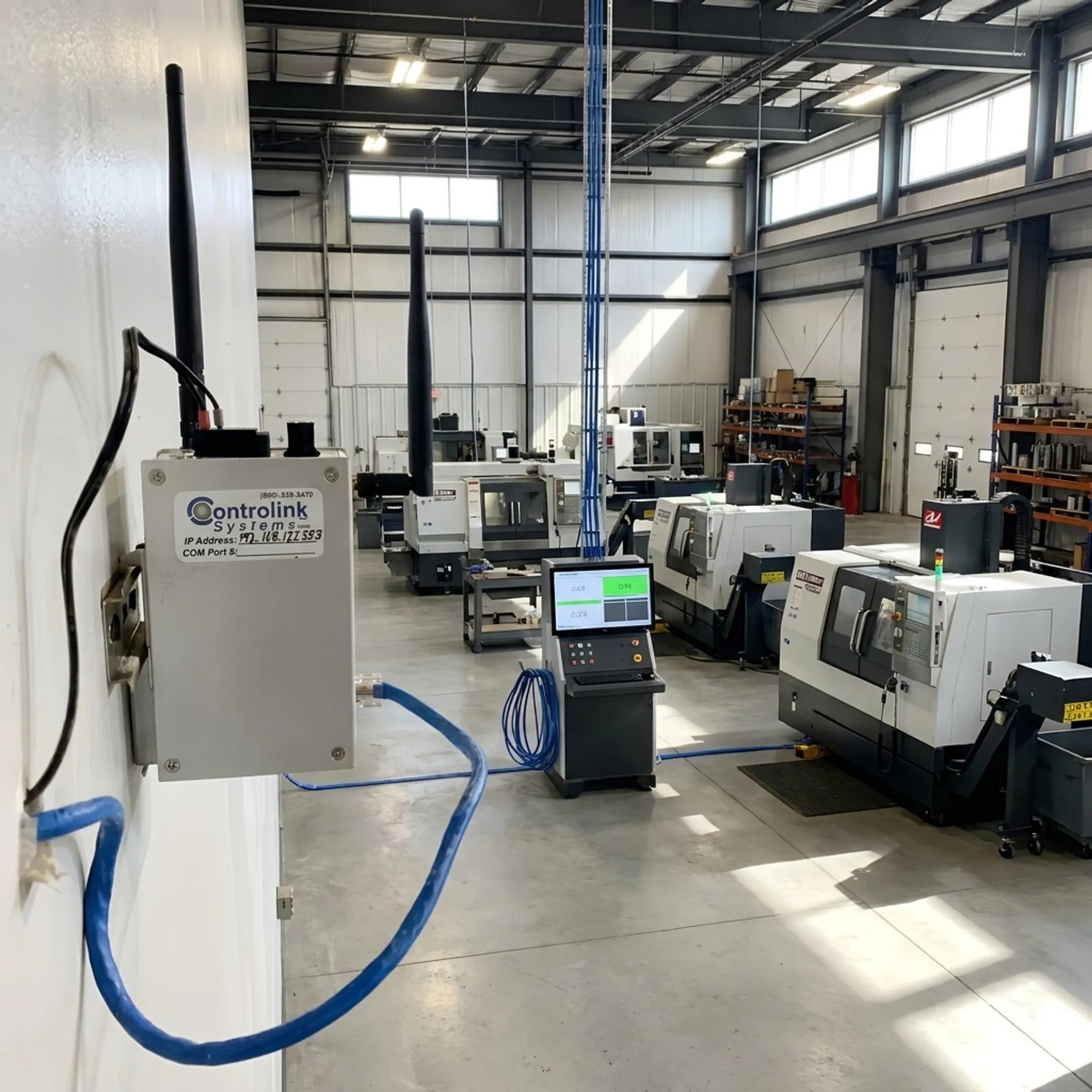 Automated CNC machine shop floor running centralized DNC file transfer software