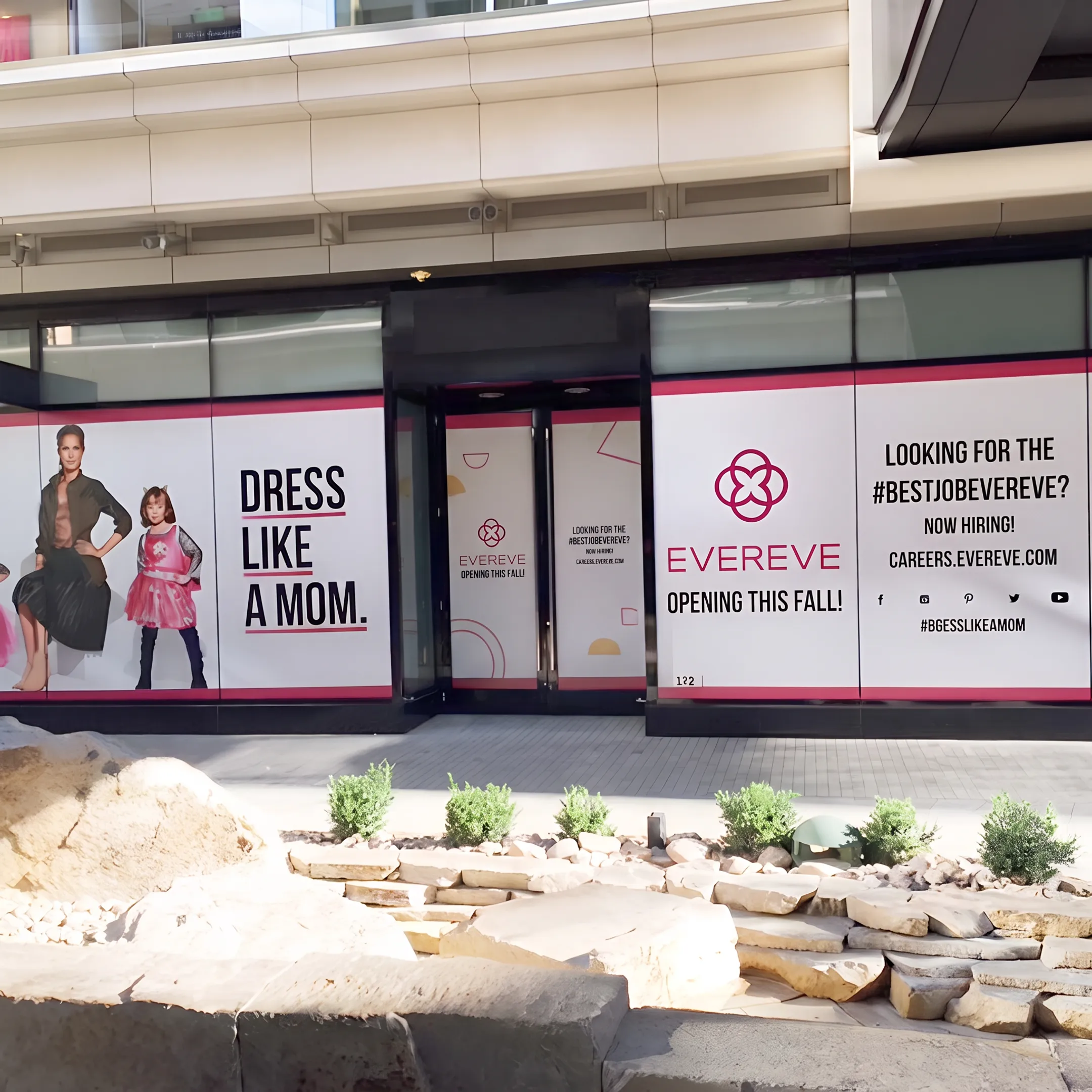 Branded vinyl wrap covering a commercial office door