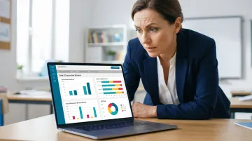 Teacher reviewing student learning analytics dashboard showing early intervention data